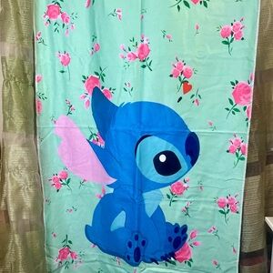 Blue Stitch Character Beach Towel with Pink Floral Accents